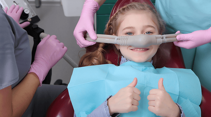 wearing a dental sedation mask